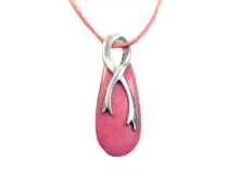 Deep pink rhodonite in all its splendor. This custom cut stone is held on both sides with a gorgeous ribbon. The twist of the ribbon becomes the natural bail and hangs from a 24" dark pink satin cord. A beautiful statement!!