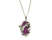 The awe of hummingbirds! Hummingbirds have the unique ability to fly backwards and are said to bring messages from the spirit world. Set in otherworldly purple stone.