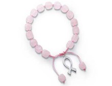 Simplicity at its finest! Hand knotted rose quartz circles the wrist. An elegant awareness ribbon is framed by a unique adjustable feature. Share the message!